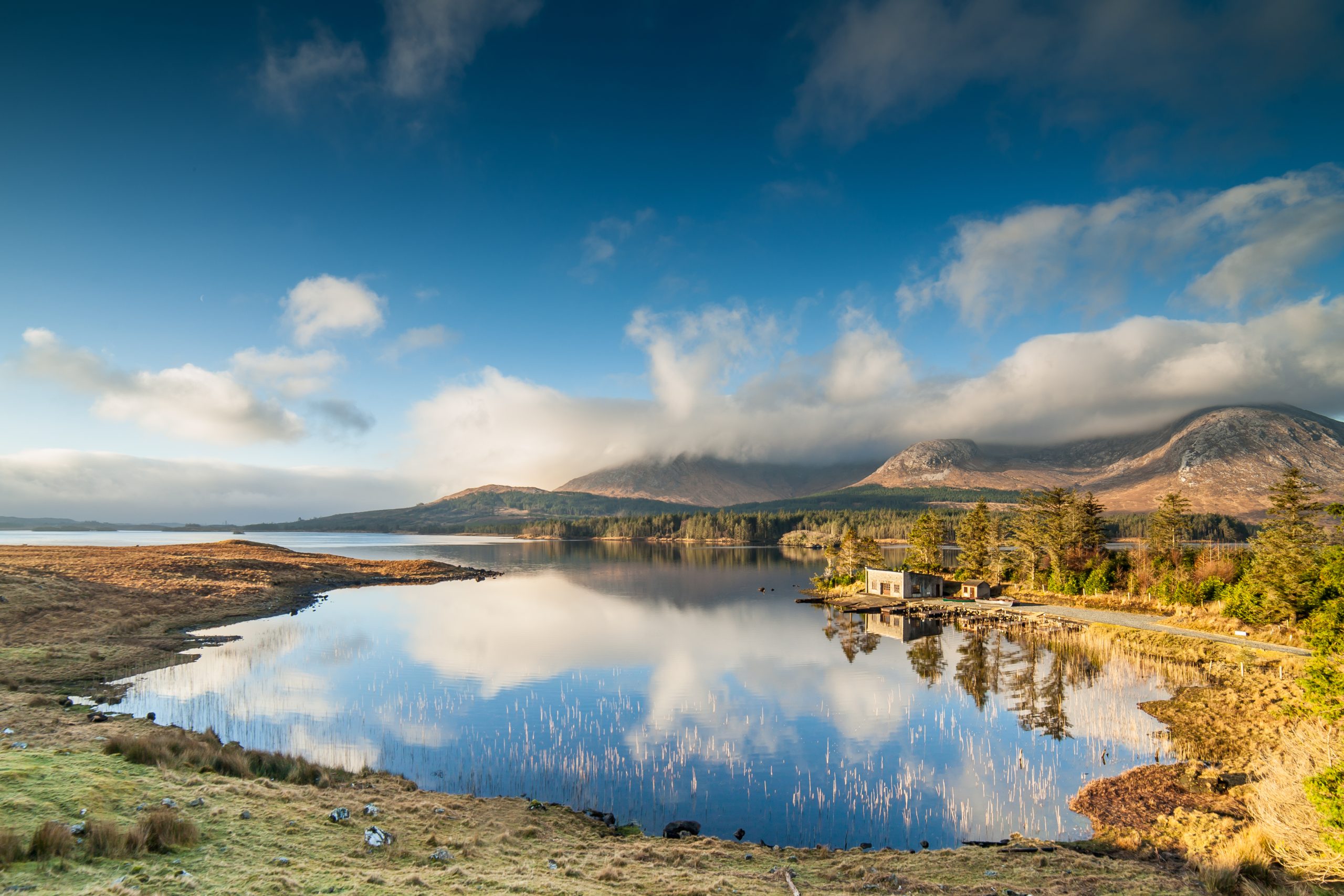 Winter Sunrise over a still lake in Connemara, in the West of Ireland.